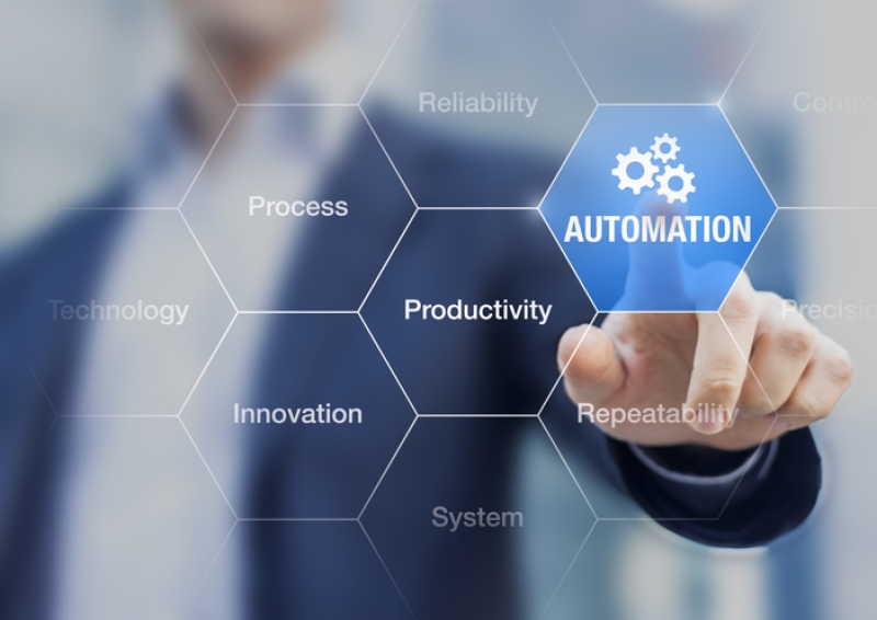 automation predictions 2022 man pressing automation button
