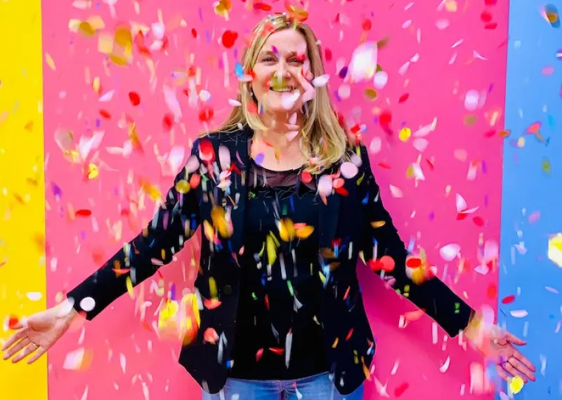 Woman celebrating with confetti