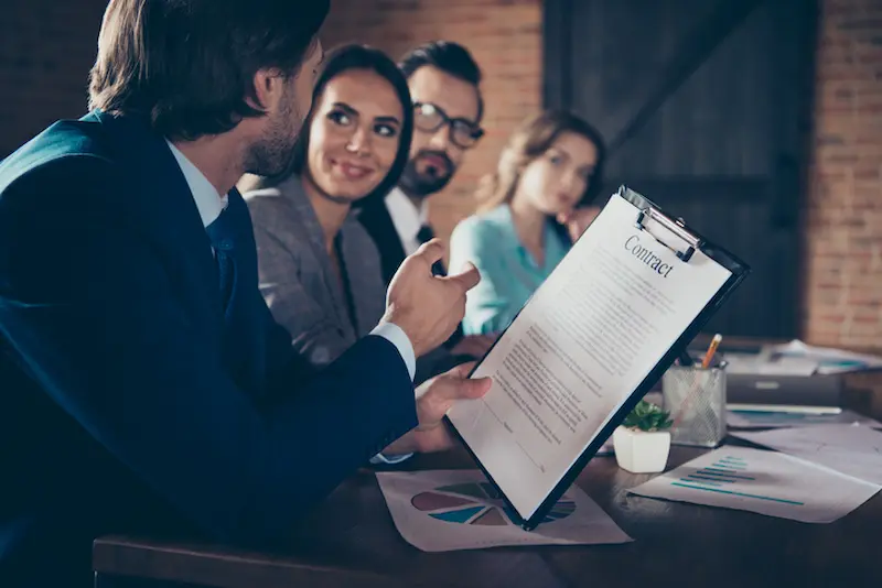 people discussing contract