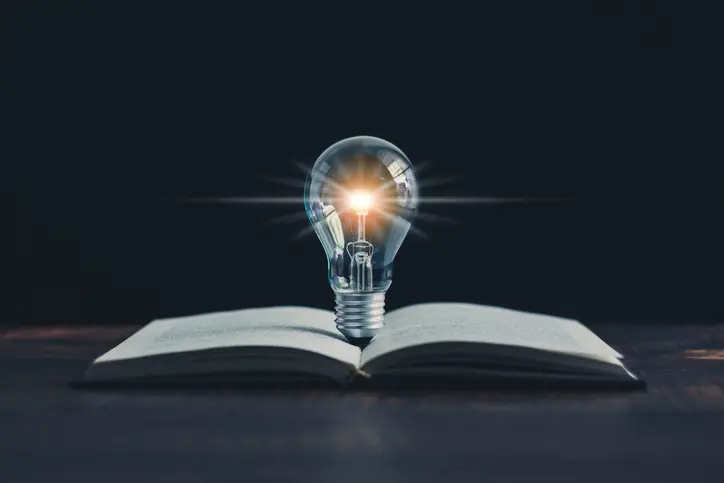idea lightbulb in book