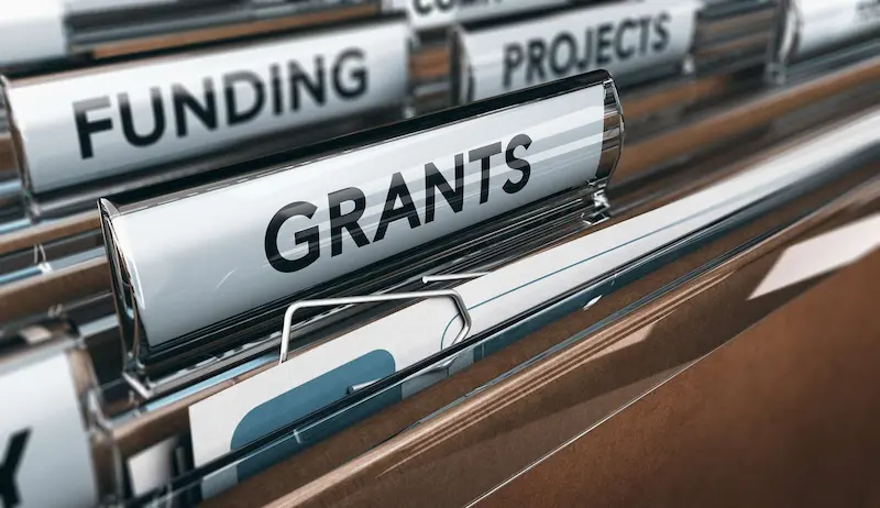 funding grants file dividers labelled funding grants projects